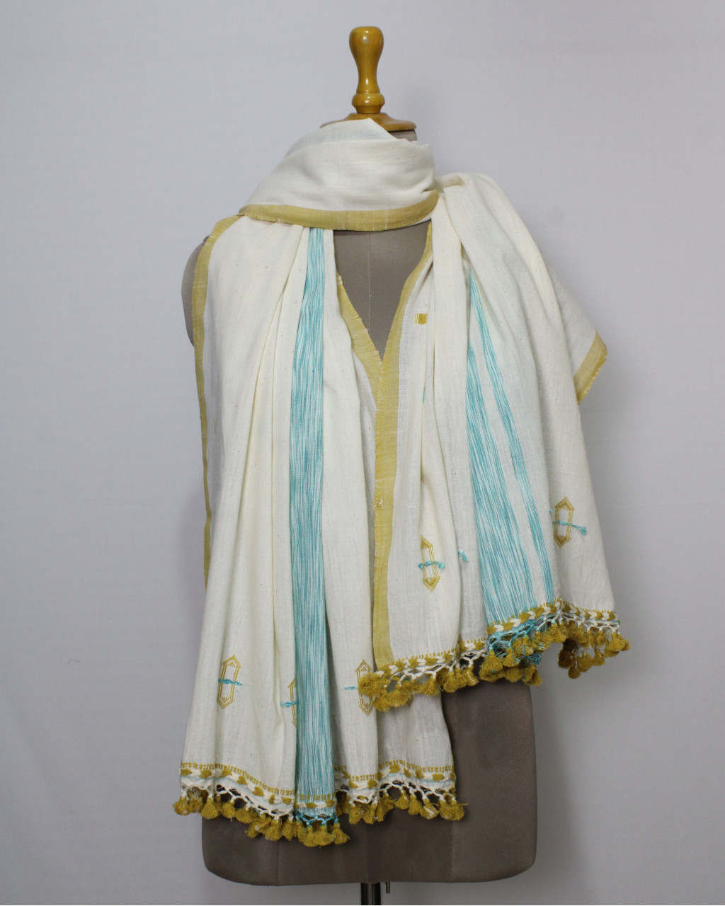 (2520) Kala cotton and cotton Azo-free dyed Kutchy dupatta from Kutch with kala cotton motifs and kala cotton motifs - Off white, sky blue, space dyed, motif, mustard yellow, turquoise, pompoms, yellow